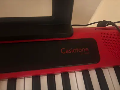 Red 61-Key Portable Electronic Keyboard with Stand and Sustain Pedal