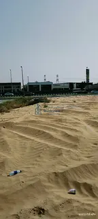 Commercial land for sale in Al-Hoshi, Sharjah (Al-Badi' Suburb).