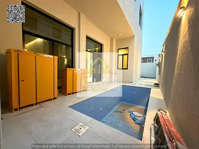 Luxury modern villa for sale with swimming pool in Ajman - including electricity, water and central air conditioning fees