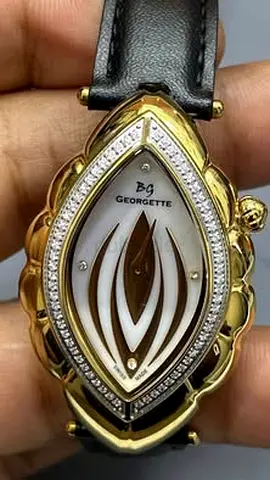 Gold-tone Gevril women's dress watch with diamond accents - leather strap