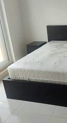 Upgrade your bedroom with this IKEA queen-size hydraulic bed and mattress (160x200cm)
