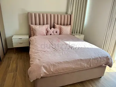 Queen upholstered bed frame with headboard and mattress - light pink