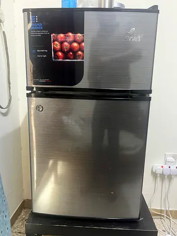 Compact stainless steel mini fridge with freezer compartment - excellent condition