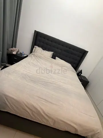 Queen bed with tufted headboard and base - and two bedside draws