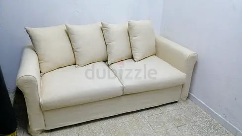 Cream 3-seater Sofa bed with Removable Cushions - Good Condition