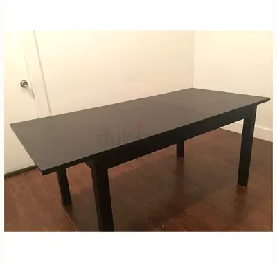 IKEA Solid black extendable dining table, good condition