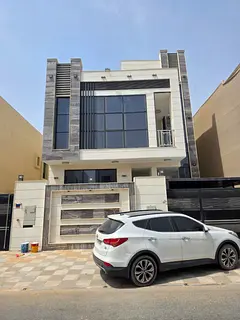 Villa for rent in Al Zahia, Ajman: 5 master bedrooms, a living room, a majlis, a kitchen, a maid's r