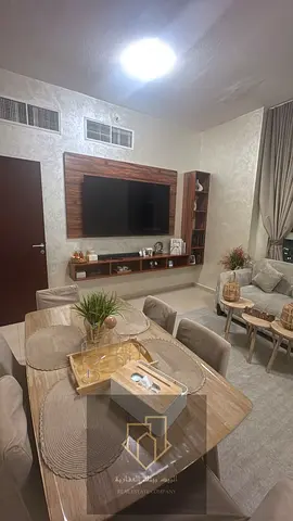 Two bedrooms and a living room for sale in City Towers, down payment 230,000