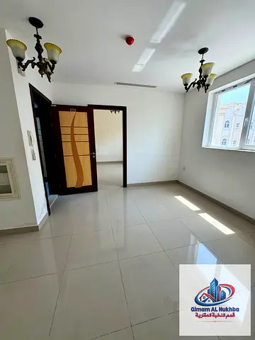 1-bedroom apartment in Al Naba'ah, second tenant, central AC and gas, AED 26,000 annually, 4 or 6 installments, 1 month free, dirt parking, with easy
