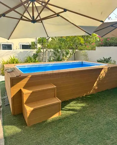 Above-ground Wooden Framed Swimming Pool with Steps