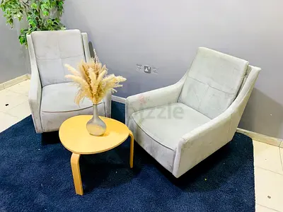 Pair of light grey fabric lounge chairs - good condition