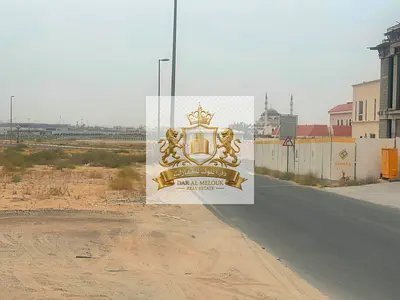 Two adjacent residential plots for sale in Al-Ruqaiba, Sharjah, totaling 11,657 sq ft, second plot from Maliha Street.