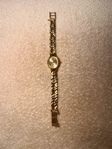 Gold women's bracelet watch
