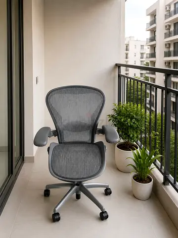 Herman Miller Ergonomic Mesh Office Chair with Adjustable Armrests and Wheels