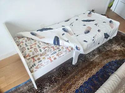 IKEA SLÄKT toddler bed (single) in white - good condition