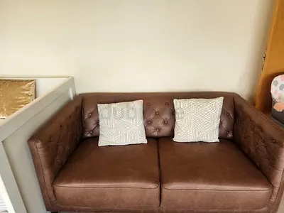 Brown 3+2 seater faux leather-look sofa set with glass premimu centre table in good condition