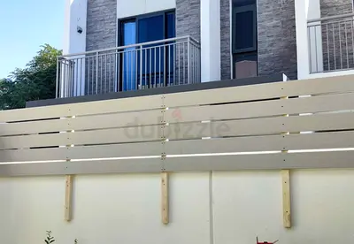 Modern horizontal slat privacy fence panels