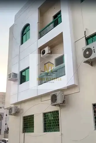 Corner Building for Sale in Al Musalla – Sharjah | Main Street | 16 Apartments | Expected Income AE