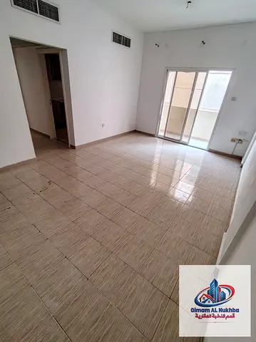 1BR in Al Majaz 3 opposite Al Safya Park, balcony, spacious kitchen, central AC & gas. AED 28K.