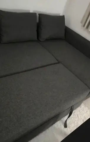 Ikea L Shape Sofa cum bed with big storage in L