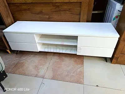 White modern TV unit with drawers and open shelves - good condition