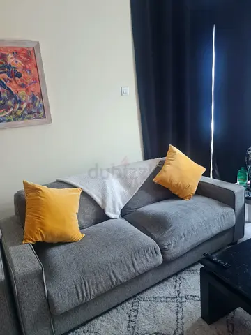 Comfortable 2-seater Grey Fabric Sofa — Good Condition