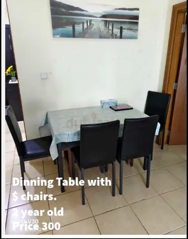 Dining table with 4 chairs - used, good condition
