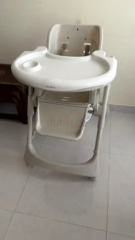 Philips Avent white adjustable baby high chair with tray