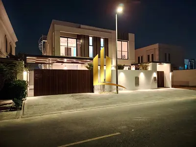 Villa for sale in Al Hooshi, Sharjah, with high-quality finishing and modern design. Freehold owner
