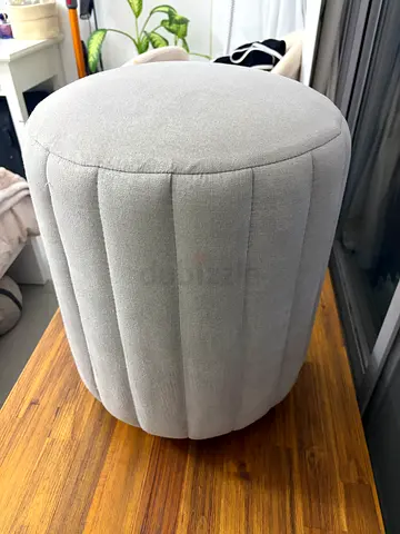 Grey fabric round ottoman stool