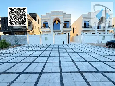 Classic villa for sale in one of Ajman's most prestigious areas, super deluxe finishing, at a bargain price including all fees.
