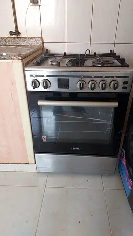 Stainless steel freestanding gas range with oven - good working condition