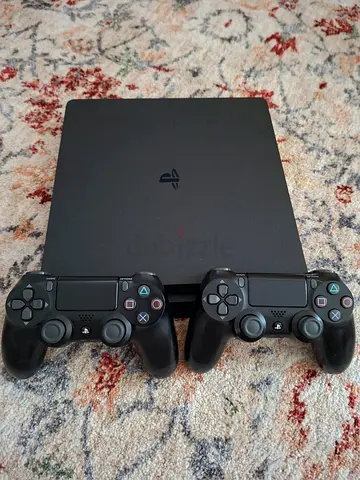 Playstation 4 with two controllers