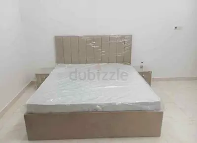 Queen size upholstered bed frame with mattress — new
