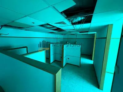 Spacious 2300 Sq Ft Office for Rent in Al Majaz 1, featuring 8 rooms, suitable for various activities, with free AC free