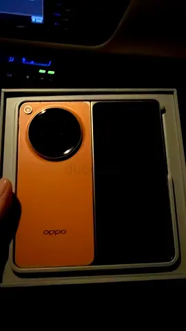 Oppo smartphone in orange — good condition with box