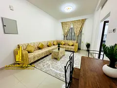 Luxury apartment, second occupancy, one bedroom and living room with a balcony and open view. Ajman,