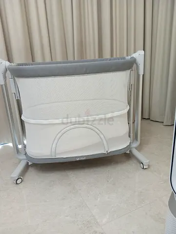 Portable bedside bassinet / small crib on wheels - good condition