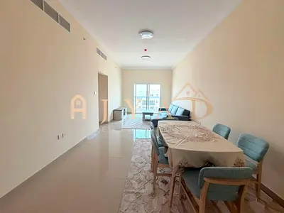 Annual rent: 2BR in Al Jurf 3, 3 baths, built-in wardrobes, central AC, balcony, flexible payments,