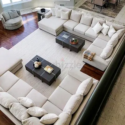 Large neutral solid-color area rug — light beige, modern minimal look