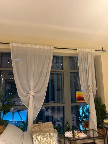 Lightweight white sheer curtains — pair, gently used