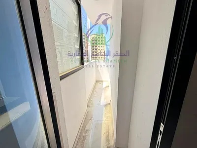 One Bedroom and Living Room First Tenant for Rent in Al Mamzar Sharjah Two Bathrooms Balcony Parking Modern Building Near Dubai