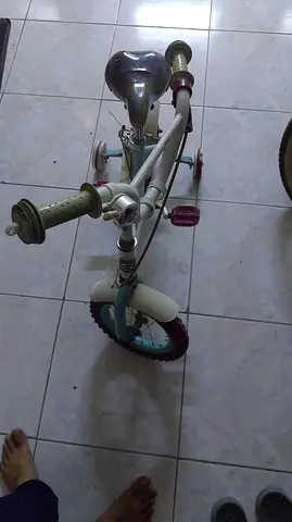 Kids bicycle with training wheels - used