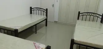Executive bachelor Bedspace available At Tourist Club Area Near Saven Color Hyper Market in TCA.