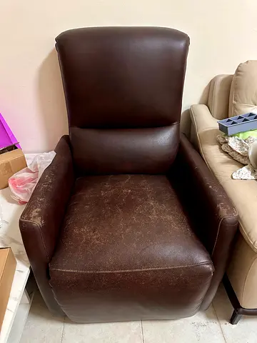 Brown leather armchair — used, good for living room