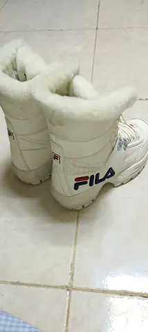 White FILA women's winter fur-lined boots, size 39