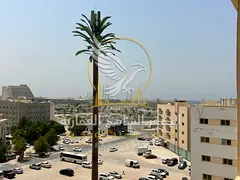 One bedroom and living room, 2 balconies with an open view, free parking, 2 bathrooms, and built-in 