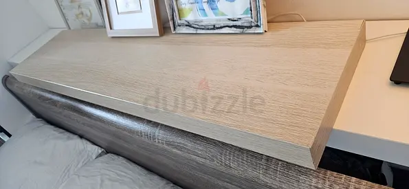 Light wood headboard/top shelf - good condition