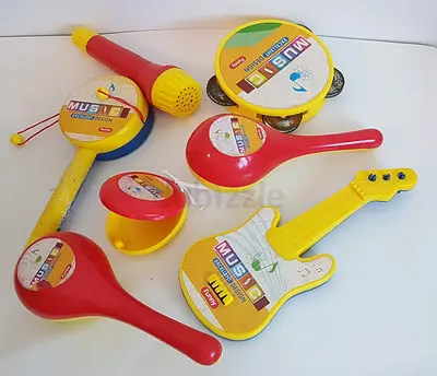 Kids Musical Toy Set – Guitar, Tambourine, Microphone & Handheld Instruments (Used)