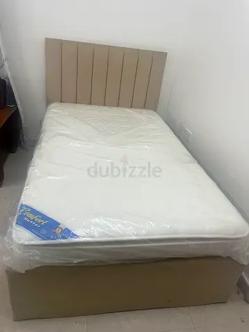 Queen size bed with mattress and headboard (like-new)